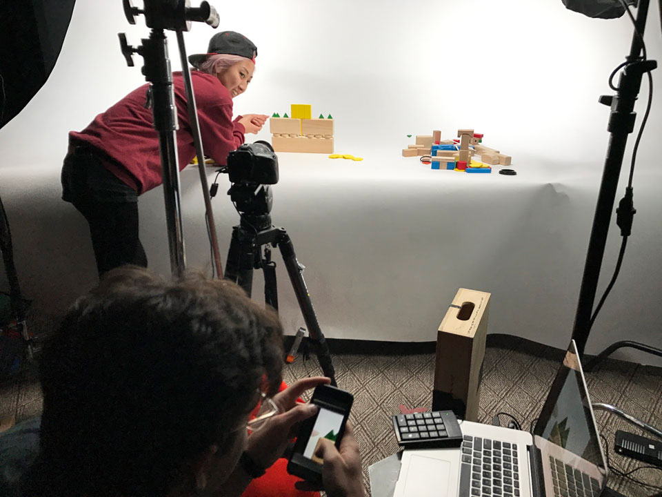 Grace Shin at the ready behind the camera